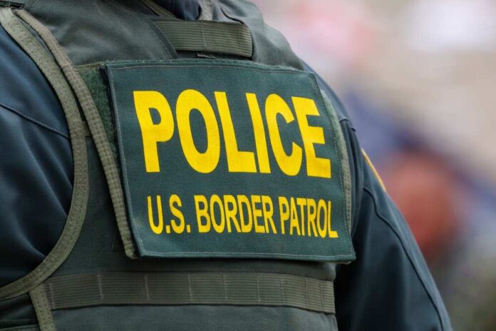 Back of US Border Patrol officers vest