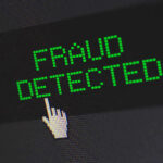 Fraud detected text with a pixelated cursor icon.