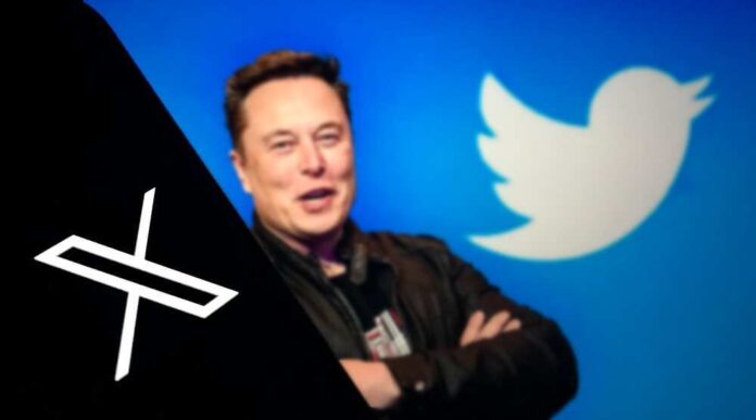 shutterstock_2336771955.jpg featured image Elon Musk with the Twitter logo.