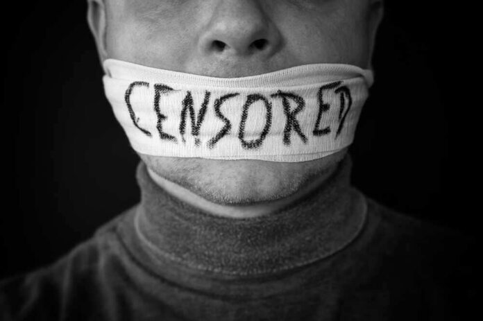 Mouth covered with censored cloth strip