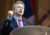 US Senator Rand Paul giving a passionate speech with fist raised