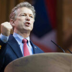 US Senator Rand Paul giving a passionate speech with fist raised