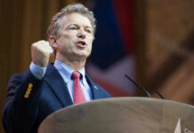 US Senator Rand Paul giving a passionate speech with fist raised