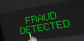 Fraud detected text with a pixelated cursor icon.