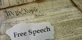 U.S. Constitution with Free Speech text overlay.