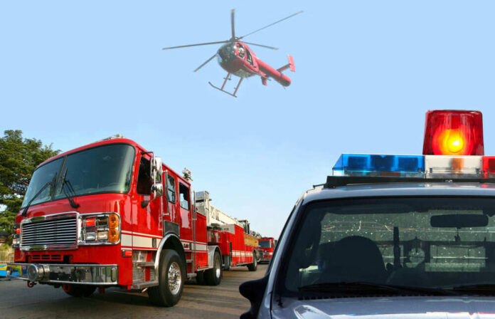 Fire truck police car and helicopter at scene