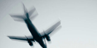 Airplane in flight with motion blur