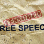 Censored stamped over Free Speech on crumpled paper.