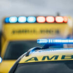 Ambulances with flashing lights on emergency scene