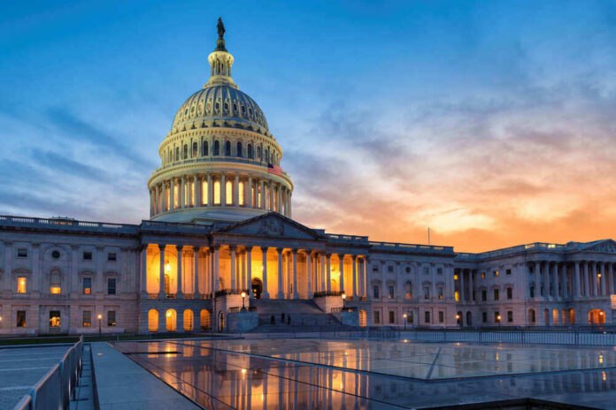 U.S. Capitol building at sunset with reflection, Washington D.C.