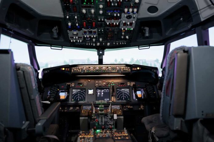 Interior view of an airplane cockpit with various instruments and controls
