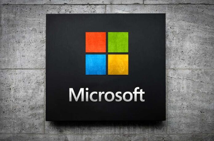 Microsoft logo displayed on a textured wall