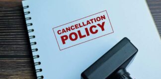 Rubber stamp on a notebook with the text 'CANCELLATION POLICY'