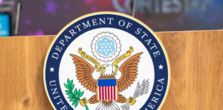 United States Department of State seal on podium