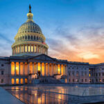 Trump’s Bold Move: Inaugurations Leaving Capitol U.S. Capitol building at sunset with reflection, Washington D.C.