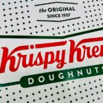 Krispy Kreme’s New Flavors Delight Fans Krispy Kreme doughnut box featuring the brand logo