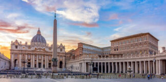 St Peters Basilica with obelisk at sunset scene