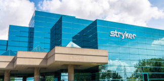 Exterior view of the Stryker Corporation building with a glass facade