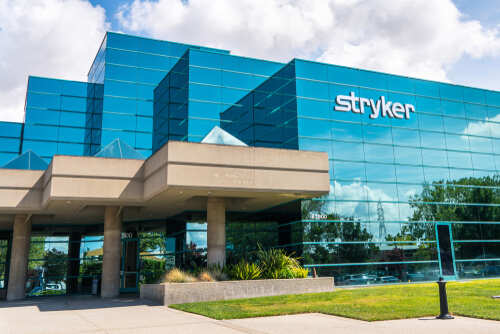 Exterior view of the Stryker Corporation building with a glass facade