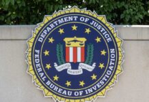 FBI seal featuring stars and laurel leaves