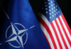NATO flag and United States flag side by side.