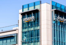 Exterior view of an Amazon corporate building with a glass facade