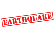 Red stamp with the word EARTHQUAKE