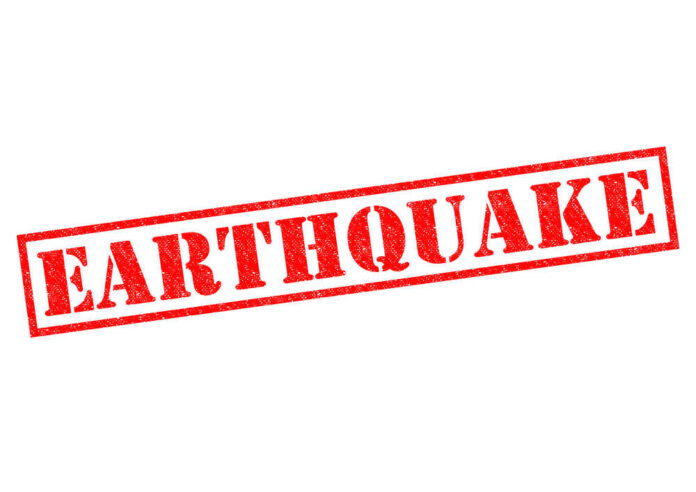 Red stamp with the word EARTHQUAKE