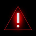 Red triangular warning sign with an exclamation mark