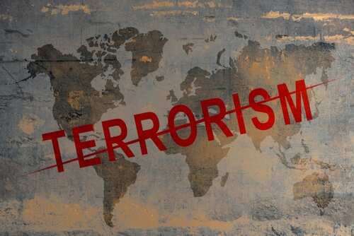 World map with the word TERRORISM crossed out in red