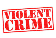 Red stamp with the words VIOLENT CRIME