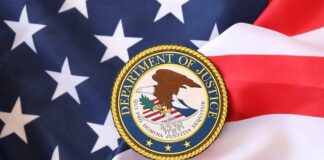 Department of Justice seal on an American flag background