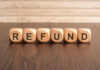 UNEXPECTED Refund Boom Stuns Millions of Taxpayers Wooden blocks spelling refund on table
