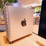 Apple computer displayed in a modern retail setting