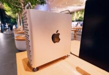 Apple computer displayed in a modern retail setting