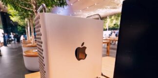 Apple computer displayed in a modern retail setting