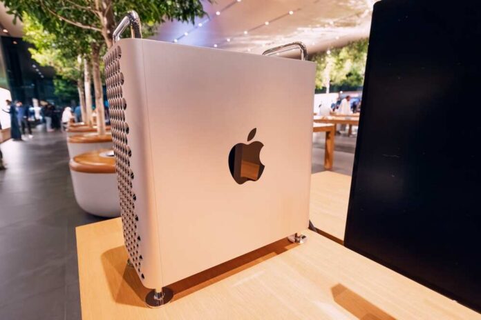 Apple computer displayed in a modern retail setting