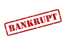 Red stamp with the word 'BANKRUPT' prominently displayed