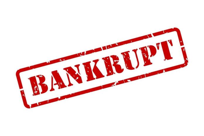 Red stamp with the word 'BANKRUPT' prominently displayed
