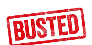 Red Busted stamp on white background