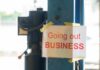 Sign stating 'Going out of Business' attached to a pole