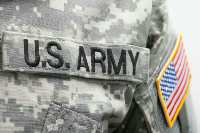 US Army uniform with American flag patch.