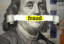 Dollar bill with fraud text overlay