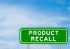 RECALL ALERT: Factory Coolant In Your Pills?! Green sign with product recall text and sky background