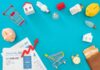 Household bills, piggy banks, and energy items on blue background