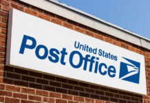 Row of blue United States Postal Service mailboxes