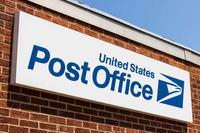 Row of blue United States Postal Service mailboxes