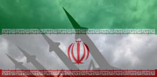 Silhouette of missiles in front of the Iranian flag