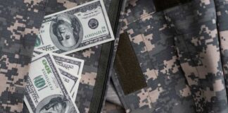 Cash placed inside a military uniform pocket