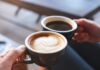 Coffee cup on table in cafe interior